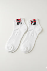 Bodyborn white socks with 'BB' logo on a light gray background in ankle size