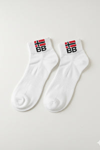 Bodyborn white socks with 'BB' logo on a light gray background in ankle size