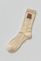 Beige sock with a bodyborn logo on a gray background in crew size premium soft and comfortable