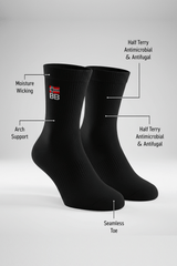 Black socks with feature labels on a light gray background soft and comfortable