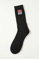 Black sock with a logo on a white background soft and comfortable