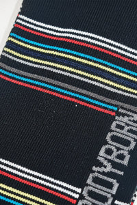 Close-up of a bodyborn sock with multicolored stripes in low cut size