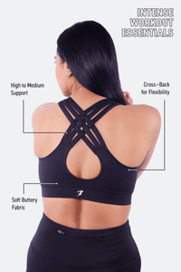 Supportive black sports bra with medium‑high support for training.
