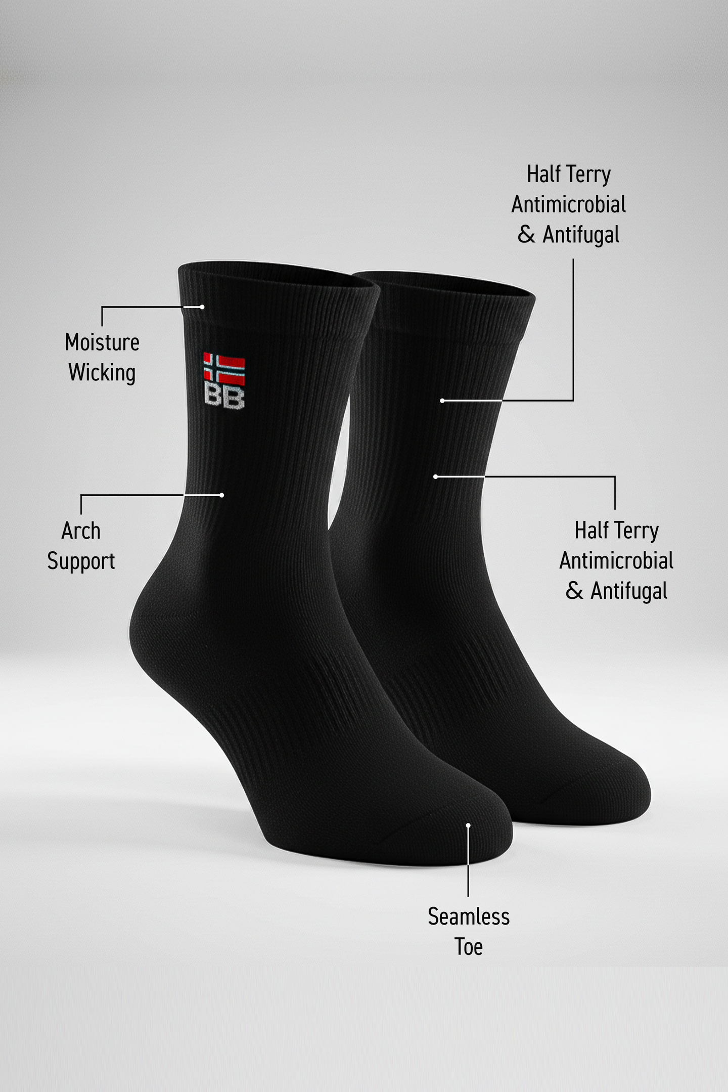 Two black BODYBORN crew-length socks with embroidered flag and BB logo, displayed upright and labeled with features such as moisture-wicking material, arch support, antimicrobial and antifungal half-terry construction, all-over cushioning through the foot and leg, and seamless toe