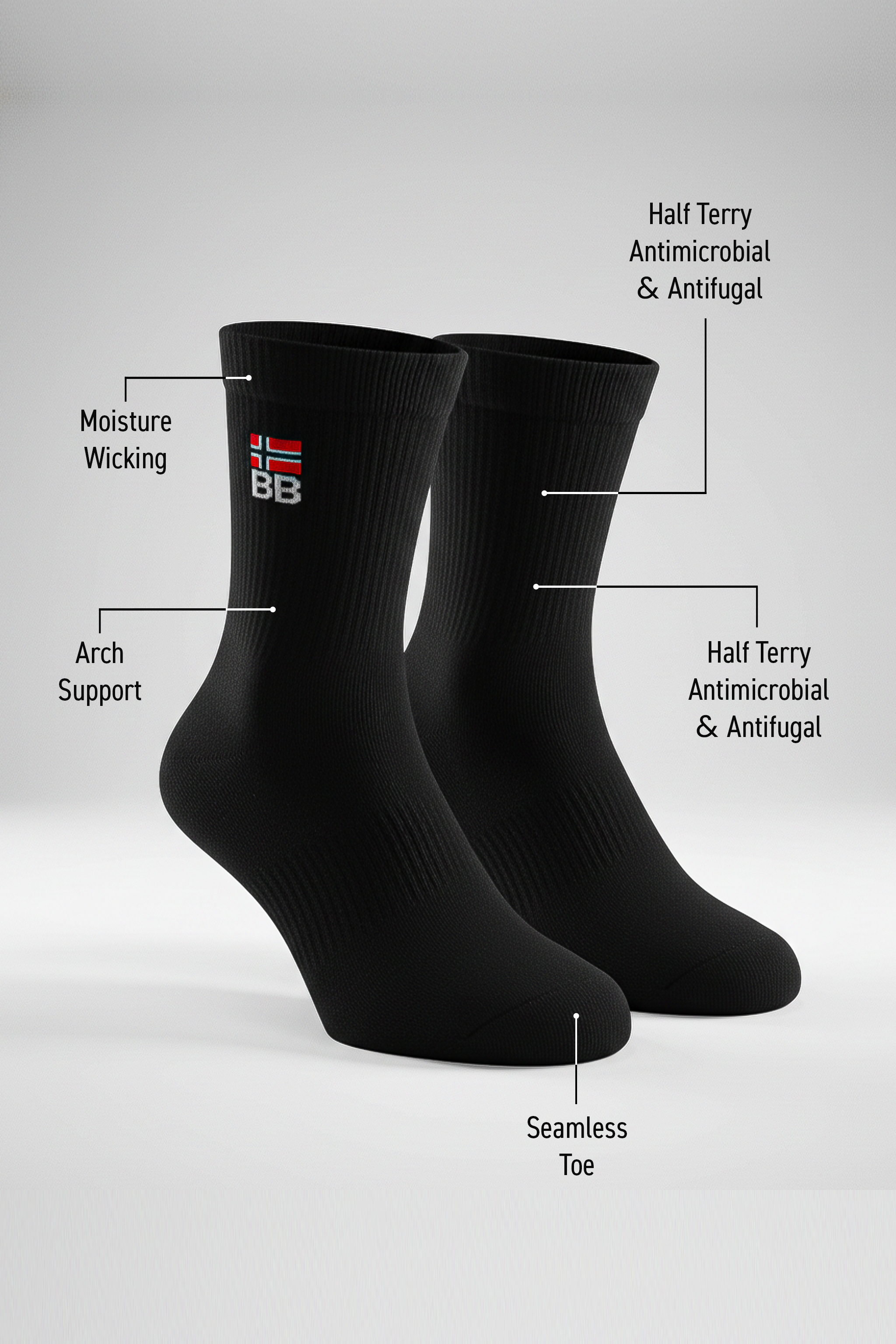 Two black BODYBORN crew-length socks with embroidered flag and BB logo, displayed upright and labeled with features such as moisture-wicking material, arch support, antimicrobial and antifungal half-terry construction, all-over cushioning through the foot and leg, and seamless toe