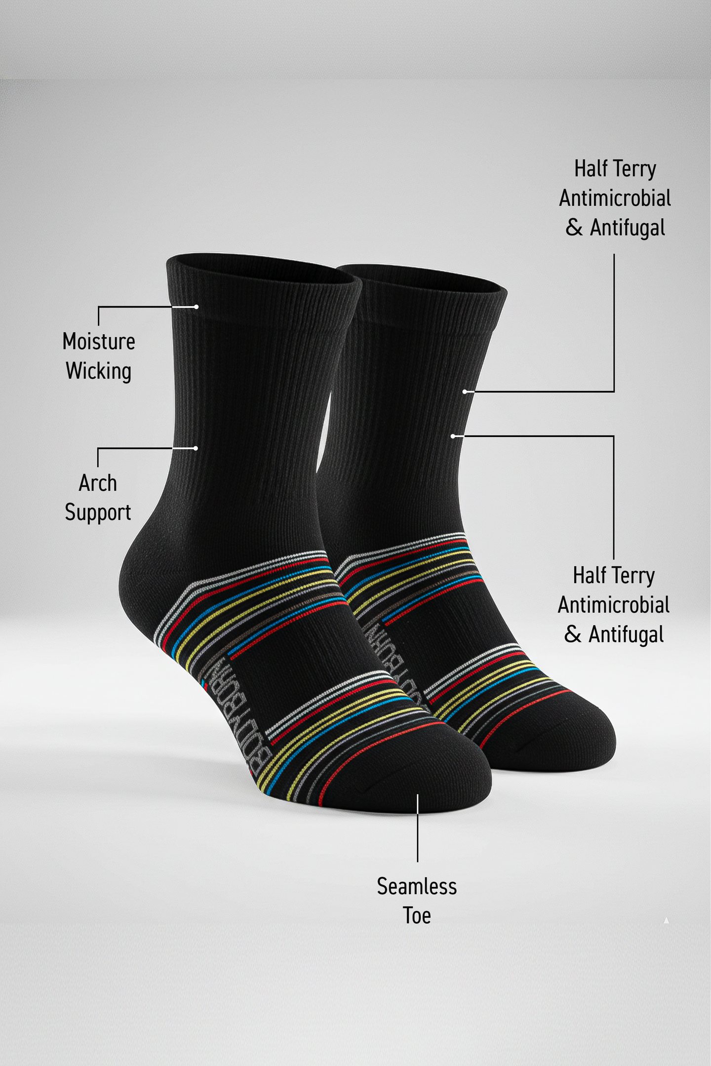 Two black BODYBORN crew-length socks displayed upright with colorful horizontal stripes, featuring labelled benefits including moisture-wicking material, arch support, antimicrobial and antifungal half-terry construction, all-over cushioning and seamless toe