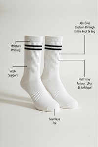 White ribbed crew socks with black double stripes featuring moisture-wicking fabric, arch support, full-foot cushioning, seamless toe and antimicrobial half terry design