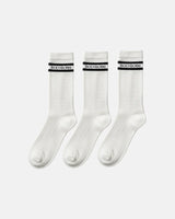 Three identical white crew socks arranged in a row, each designed with ribbed texture and a black double stripe featuring BODYBORN branding across the cuff